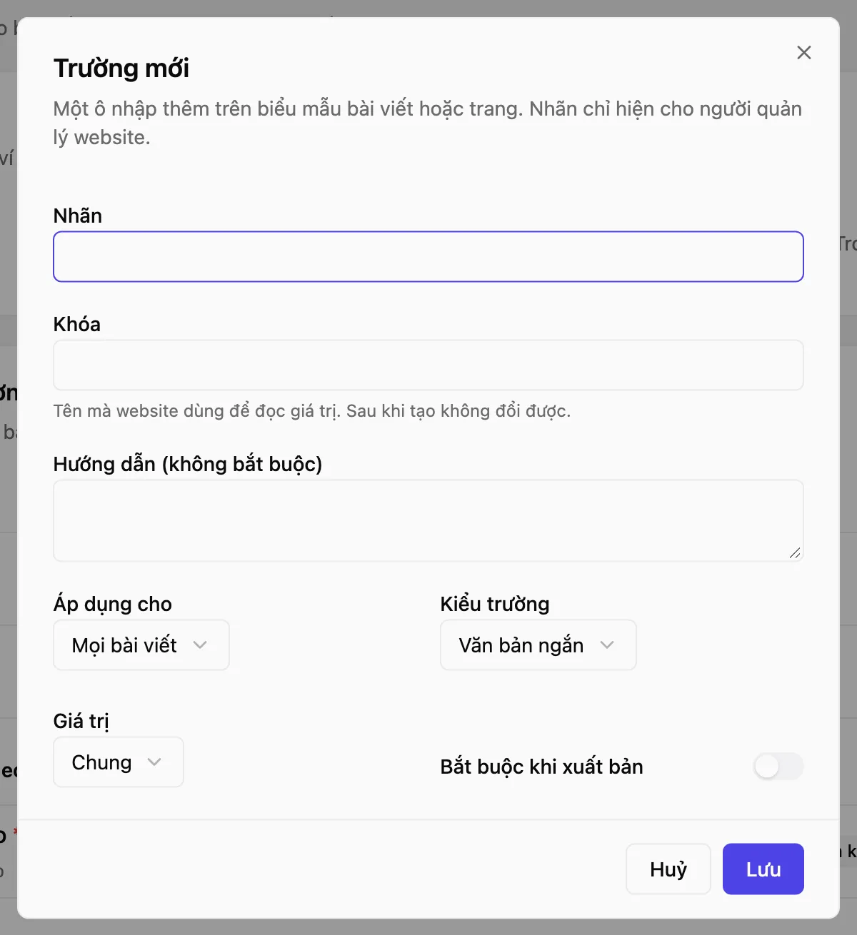 Hộp «Trường mới» với các ô Nhãn, Khóa, Hướng dẫn, Áp dụng cho, Kiểu trường, Giá trị và công tắc «Bắt buộc khi xuất bản»